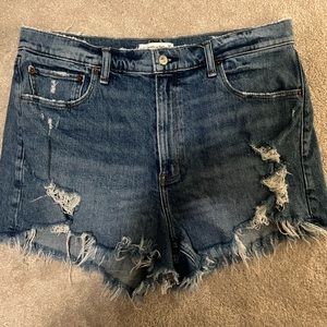 Size 32 mom short, high rise. Distressed material